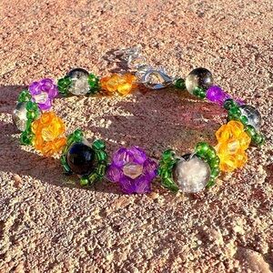 Purple and Orange Floral Beaded Halloween Bracelet with Silver Colored Accents